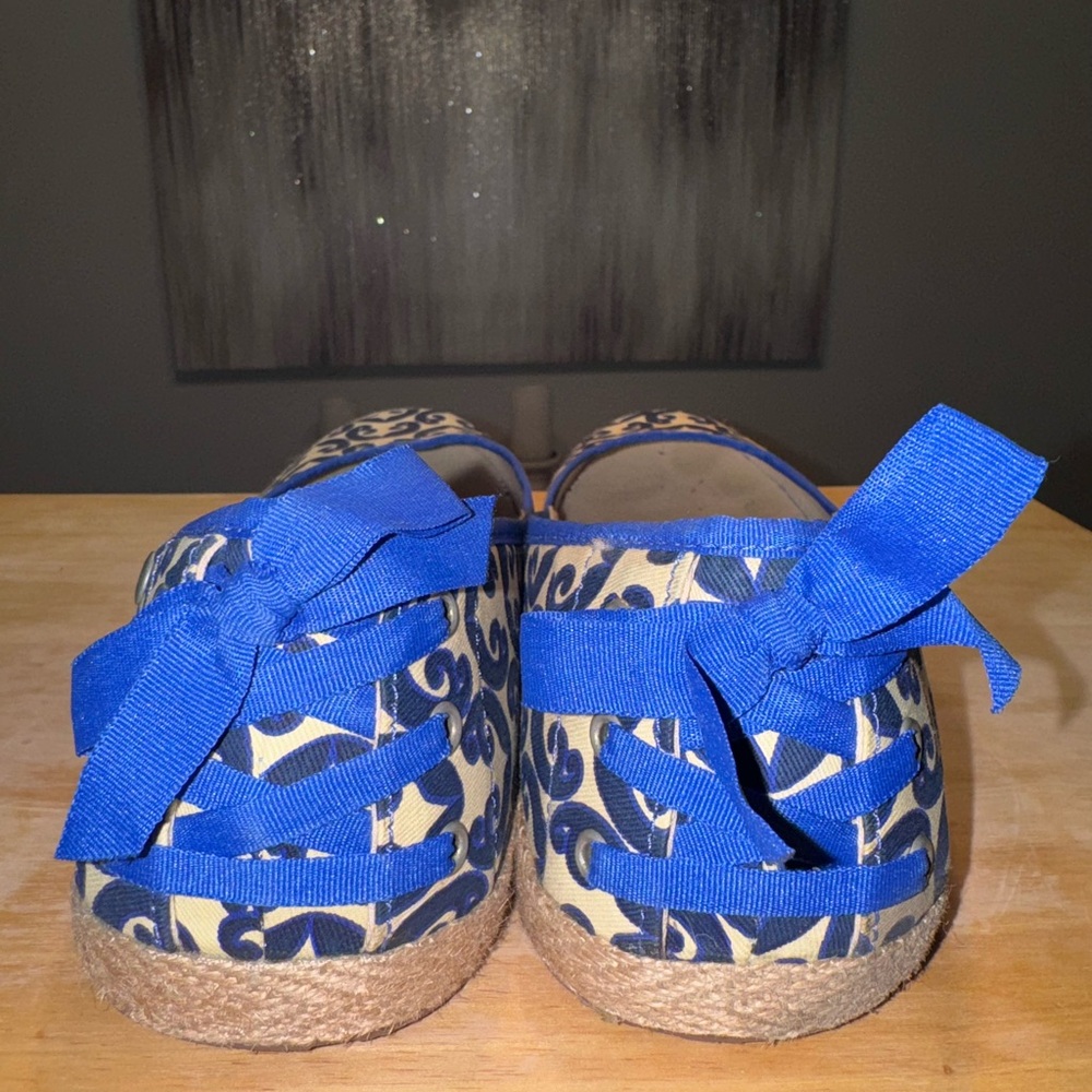 Royal Bloom and tan colored slip on ballerina woman’s UGGs